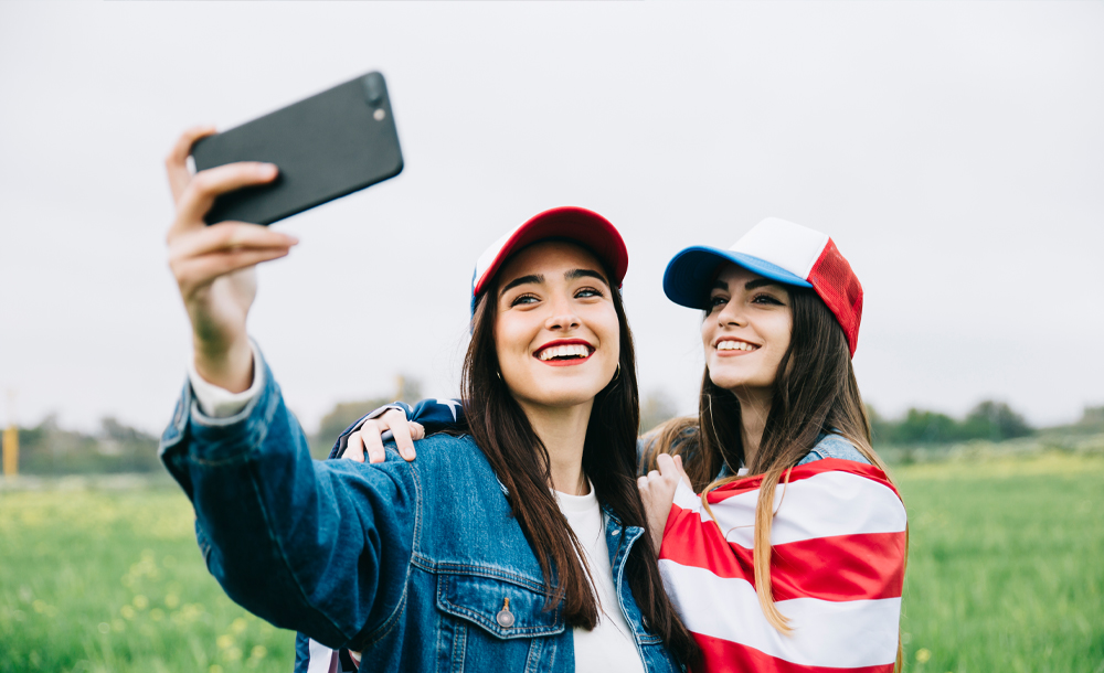 young girl with long eyelashes in a baseball cap and a T-shirt hip-hop style